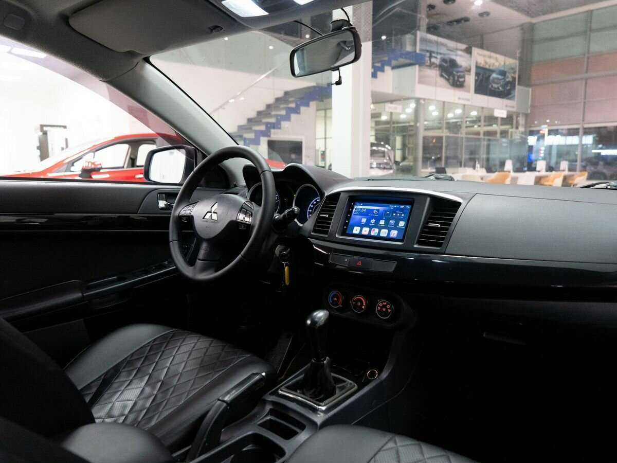Купить Mitsubishi Lancer с пробегом. Фото: #14