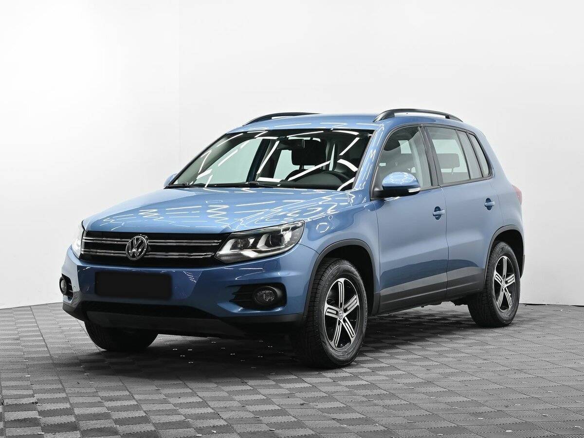 Купить Volkswagen Tiguan с пробегом. Посмотреть фото
