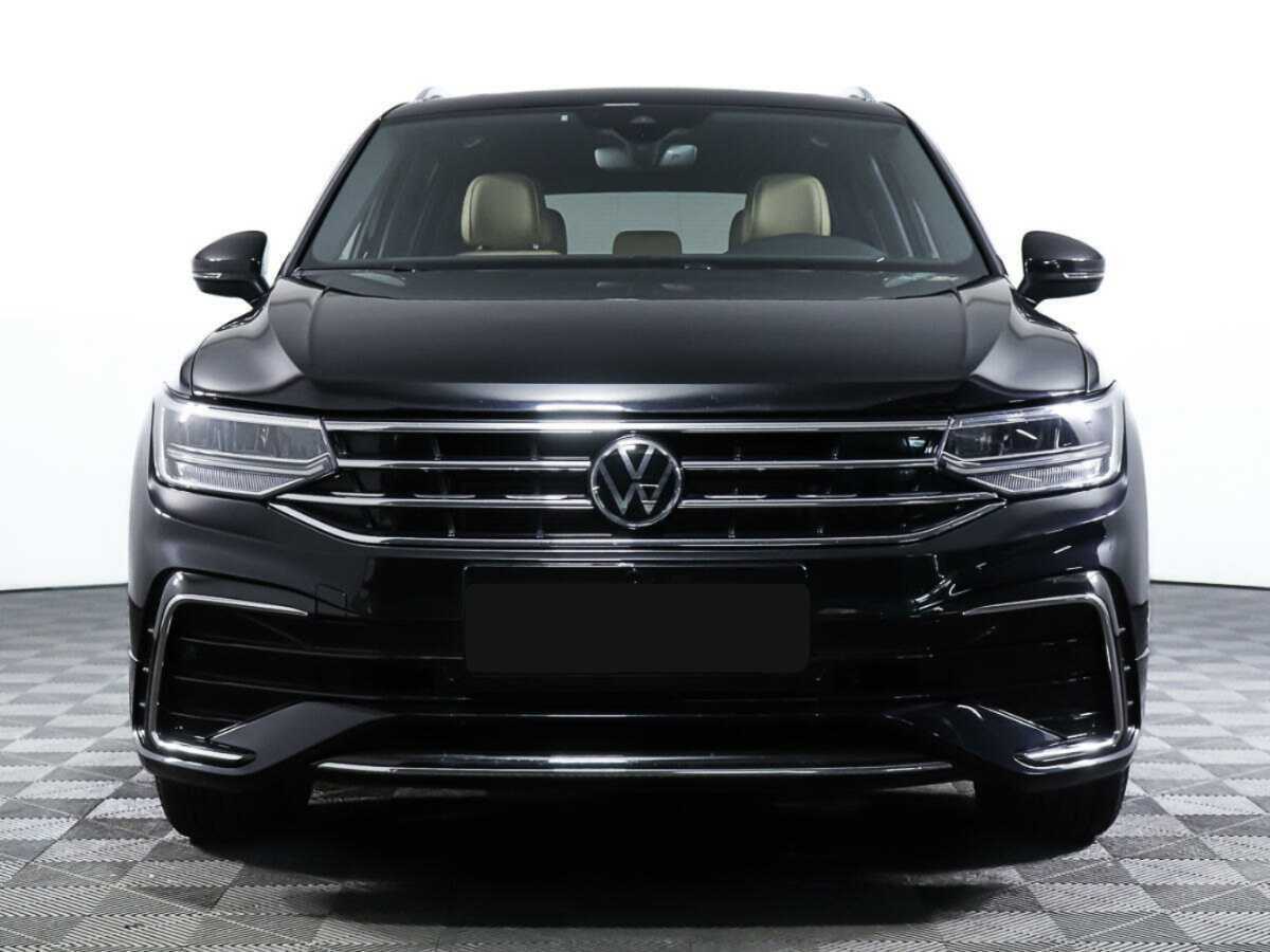 Купить Volkswagen Tiguan с пробегом. Посмотреть фото