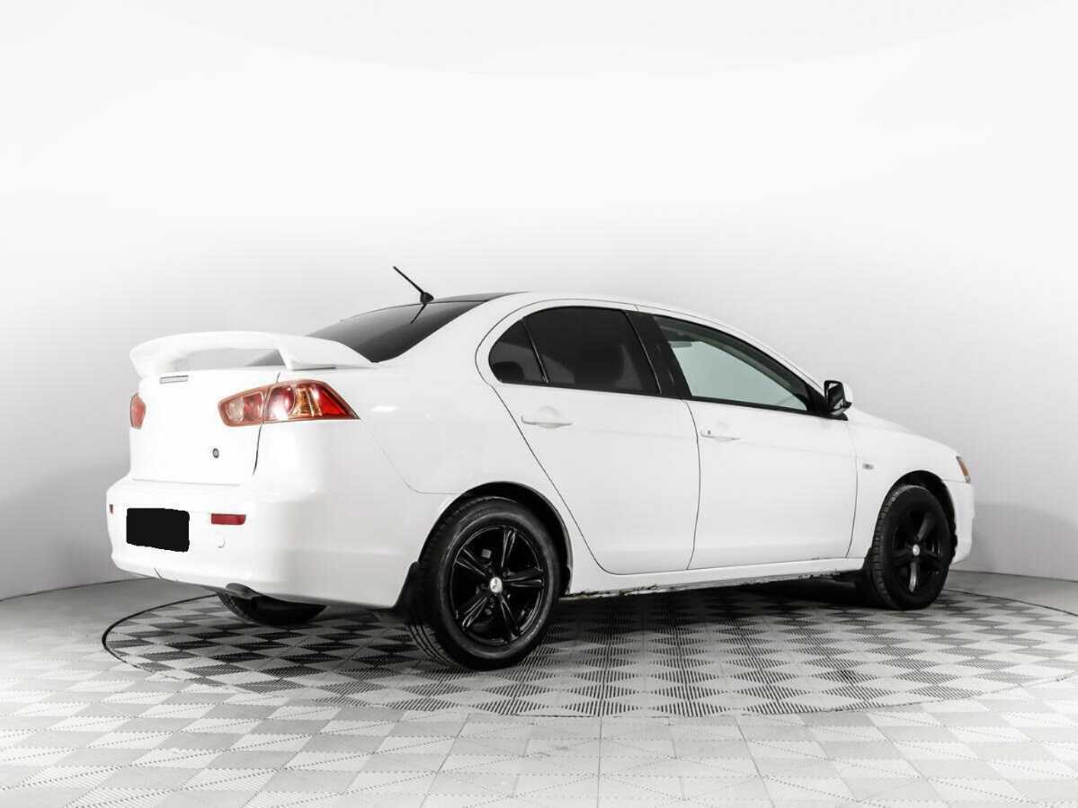 Купить Mitsubishi Lancer с пробегом. Фото: #4