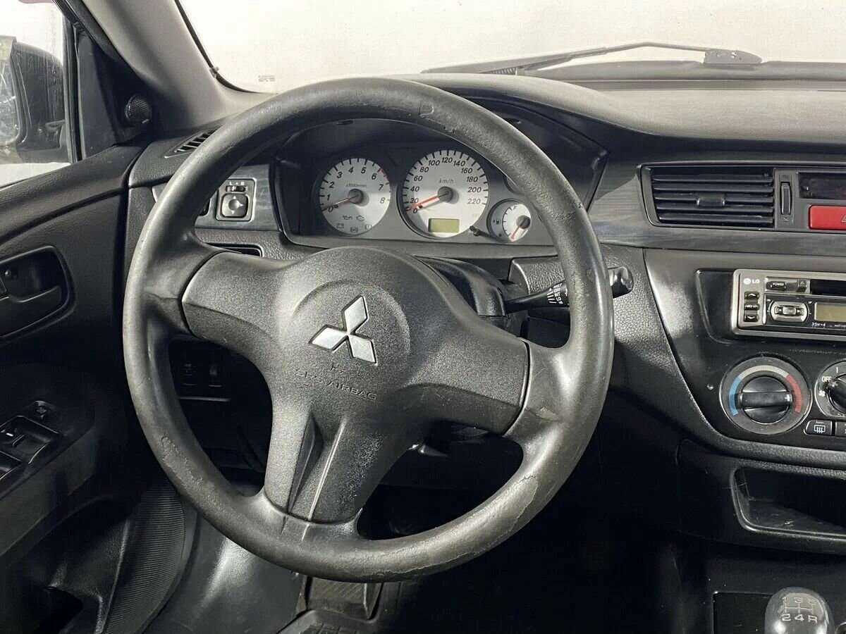 Купить Mitsubishi Lancer с пробегом. Фото: #10