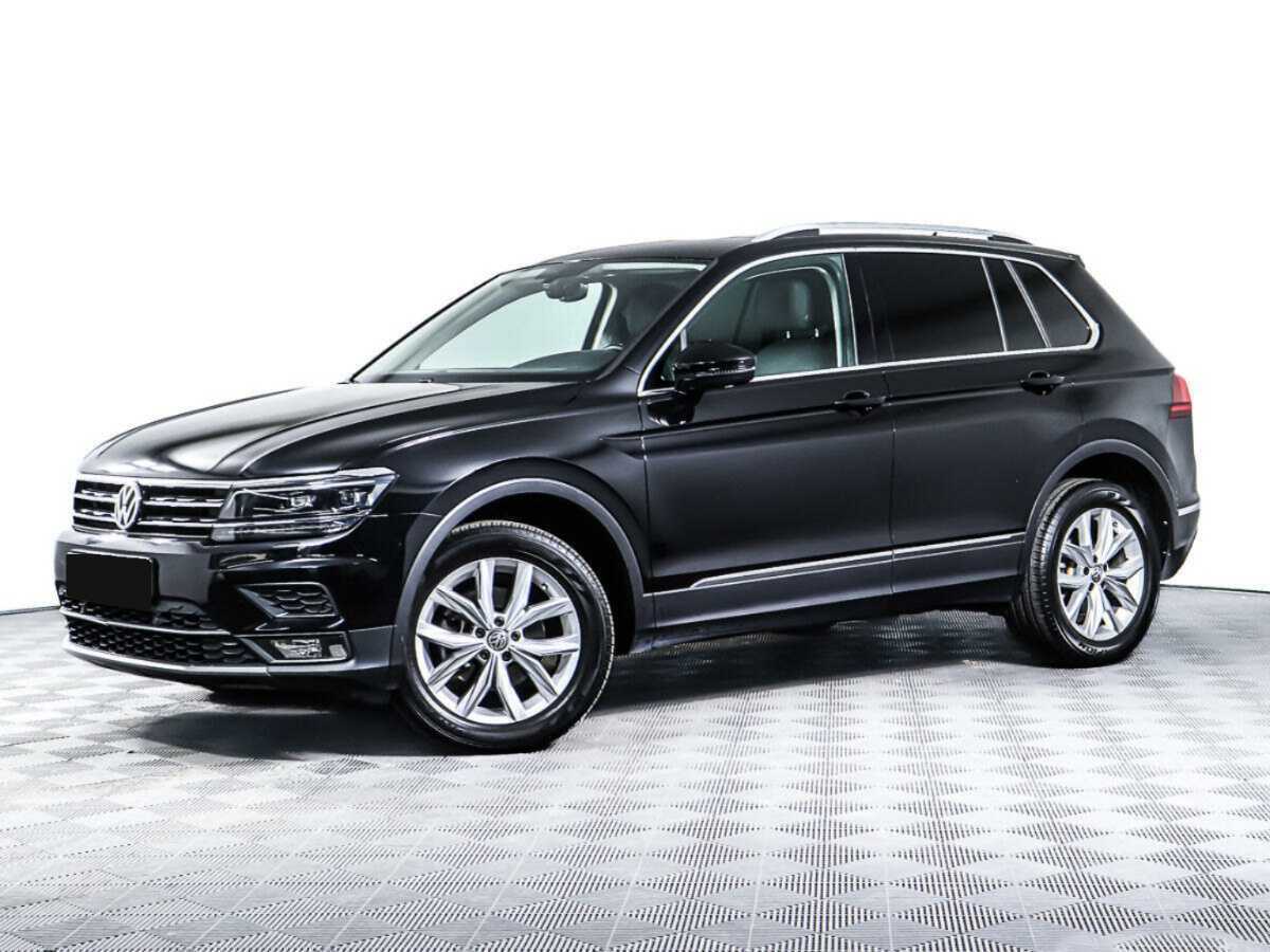Купить Volkswagen Tiguan с пробегом. Посмотреть фото