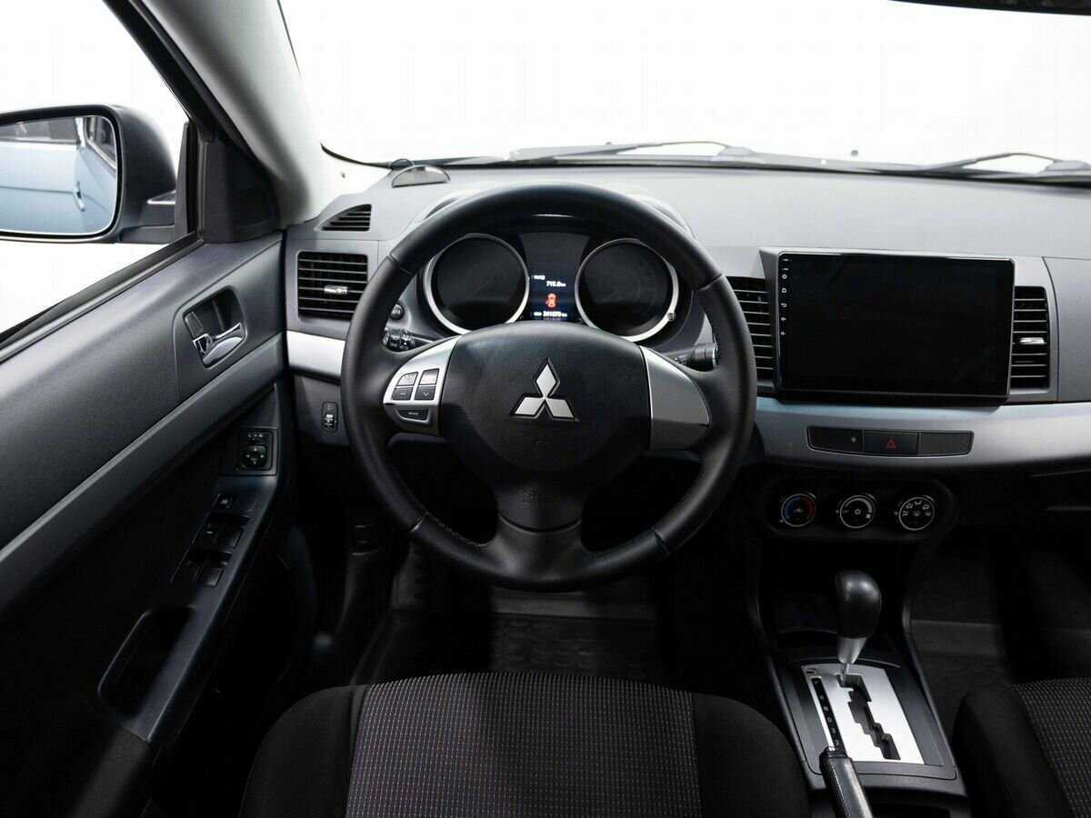 Купить Mitsubishi Lancer с пробегом. Фото: #13