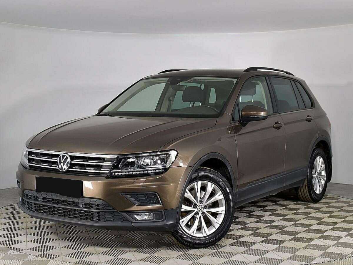 Купить Volkswagen Tiguan с пробегом. Посмотреть фото