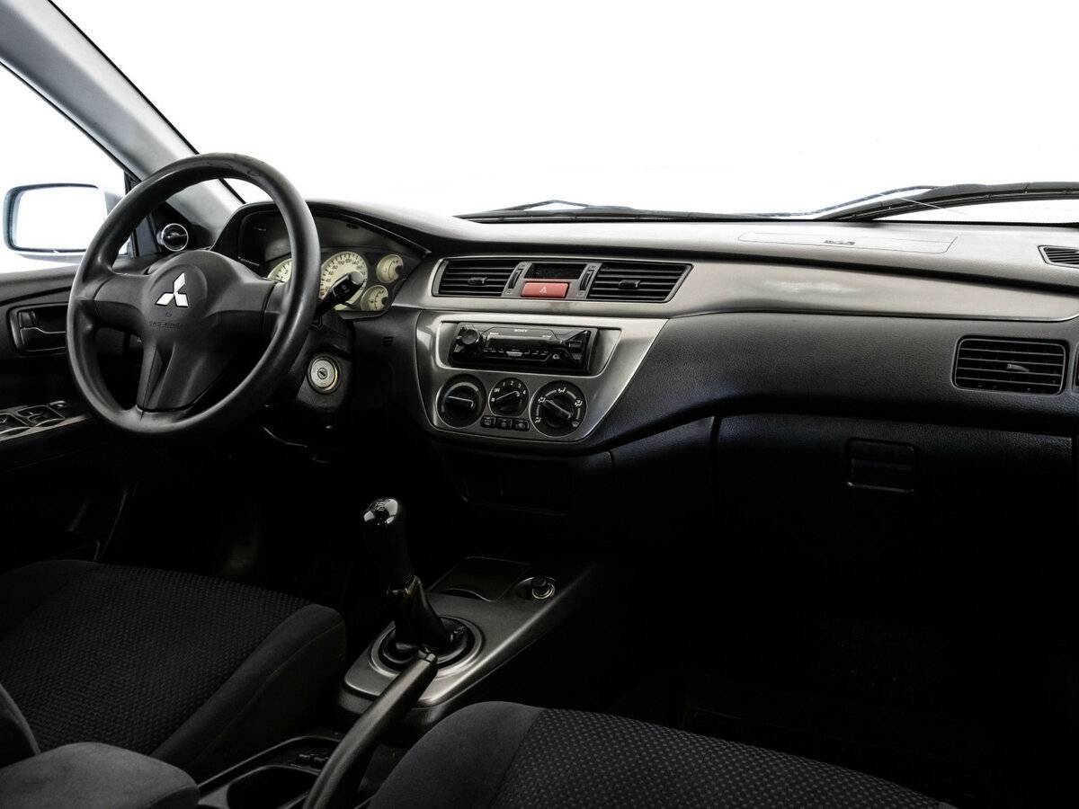 Купить Mitsubishi Lancer с пробегом. Фото: #8