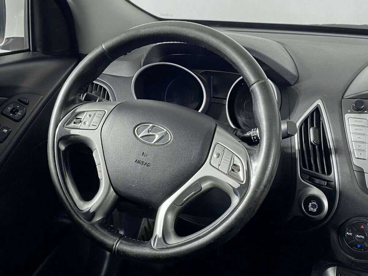 Купить Hyundai ix35 с пробегом. Фото: #9