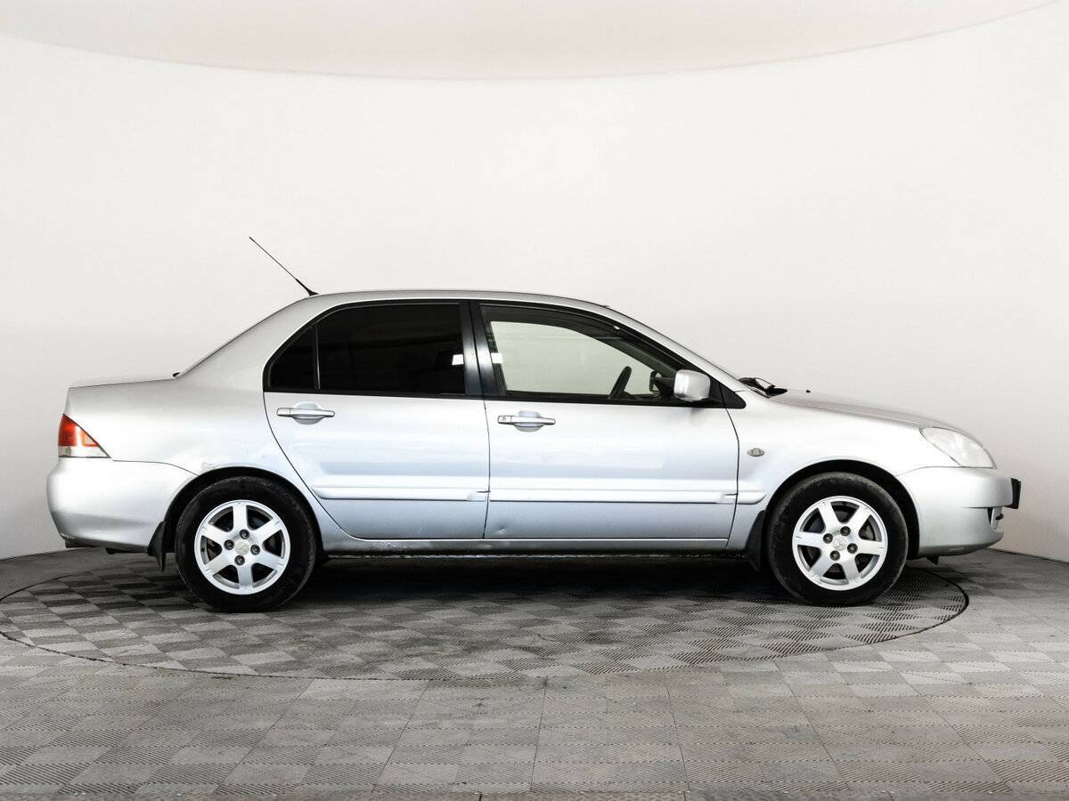Купить Mitsubishi Lancer с пробегом. Фото: #3