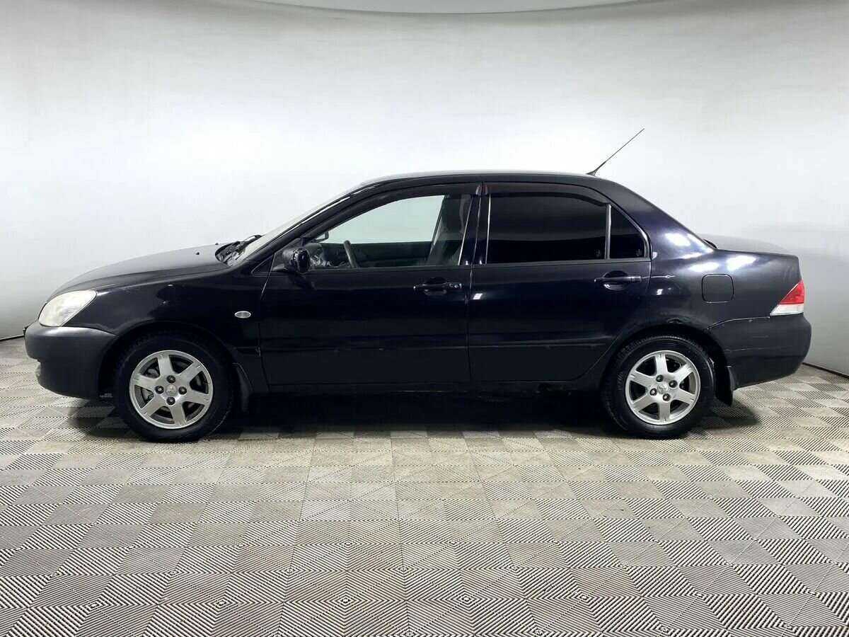 Купить Mitsubishi Lancer с пробегом. Фото: #6