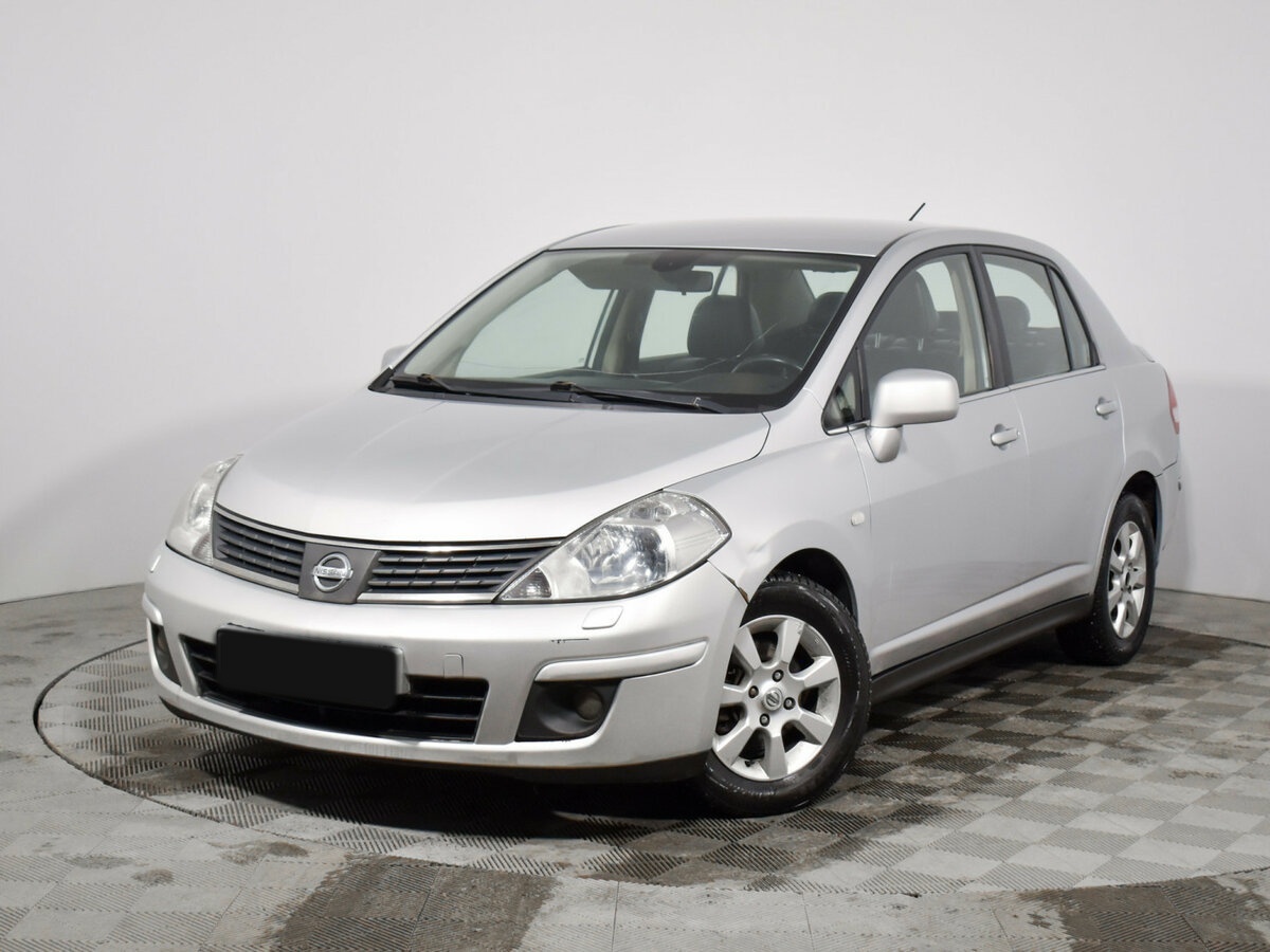 Купить Nissan Tiida с пробегом. Посмотреть фото