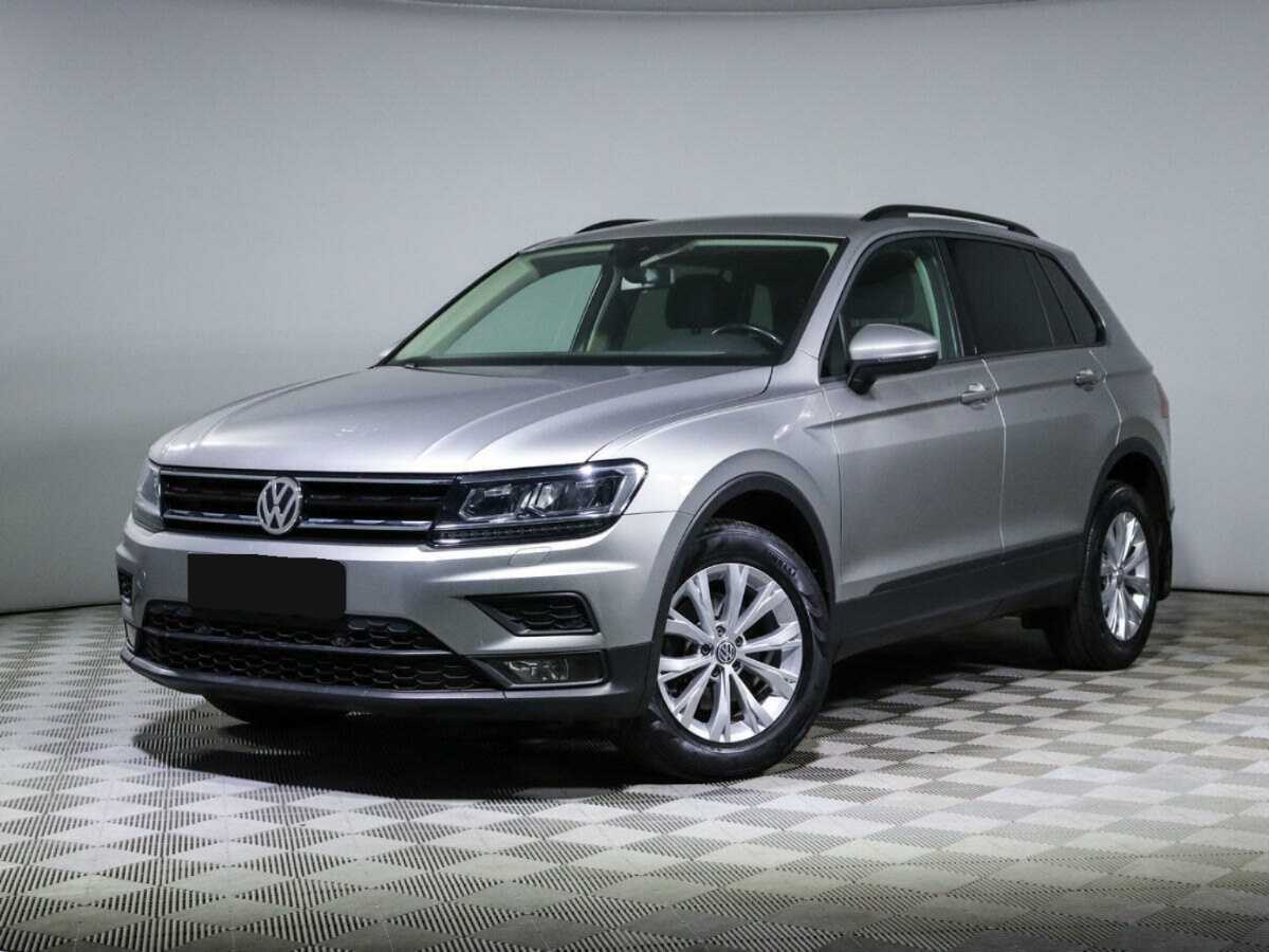 Купить Volkswagen Tiguan с пробегом. Посмотреть фото