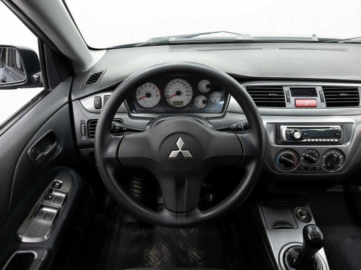 Купить Mitsubishi Lancer с пробегом. Фото: #12