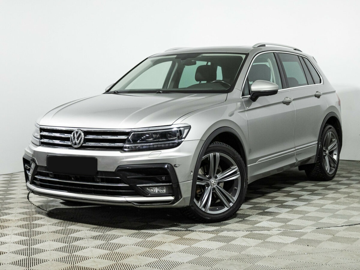 Купить Volkswagen Tiguan с пробегом. Посмотреть фото