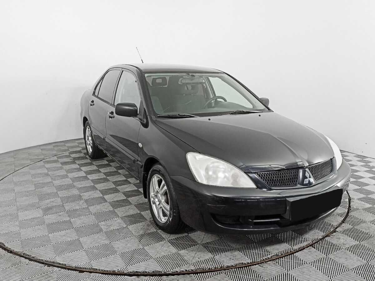 Купить Mitsubishi Lancer с пробегом. Фото: #2