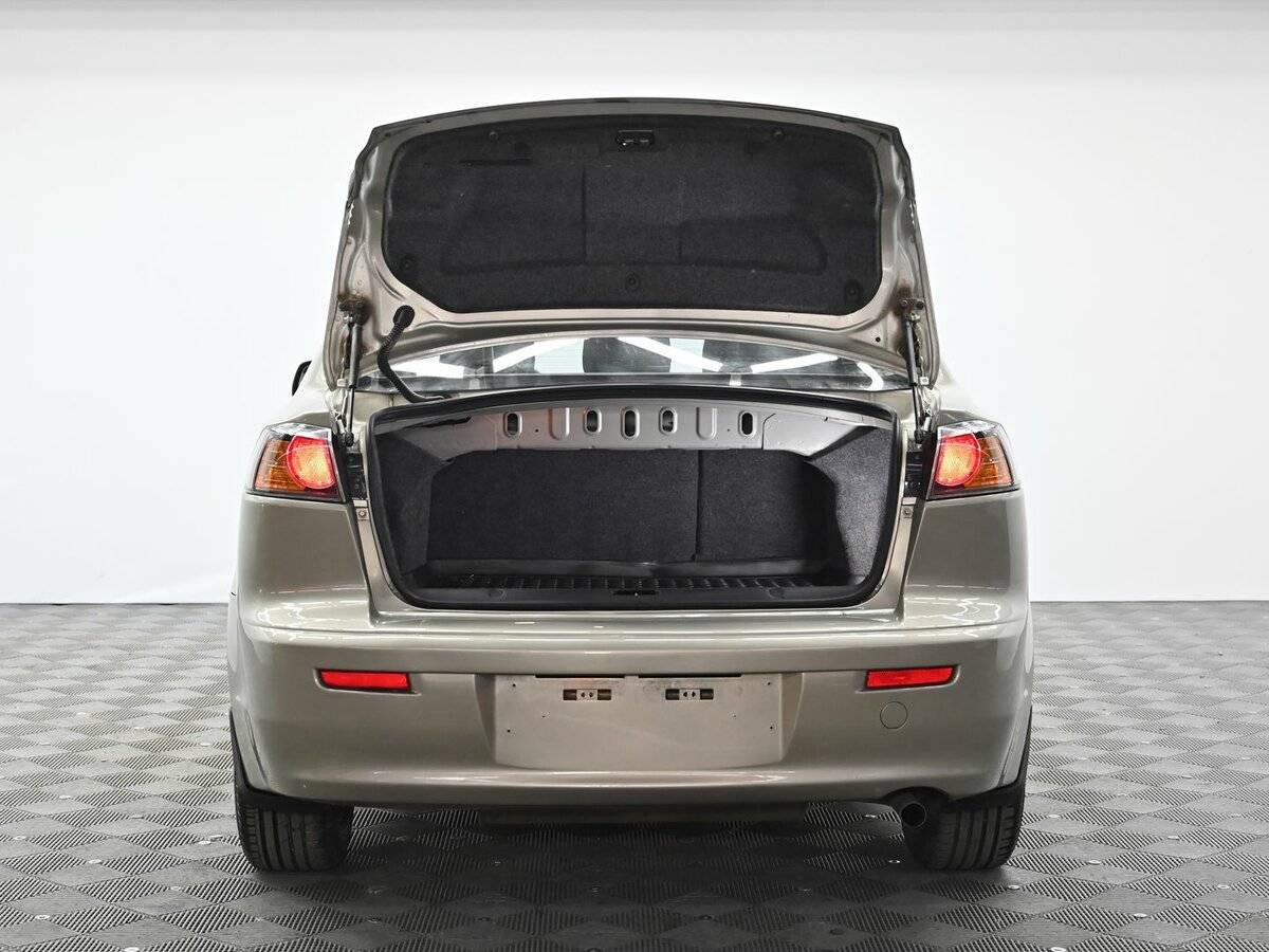 Купить Mitsubishi Lancer с пробегом. Фото: #4