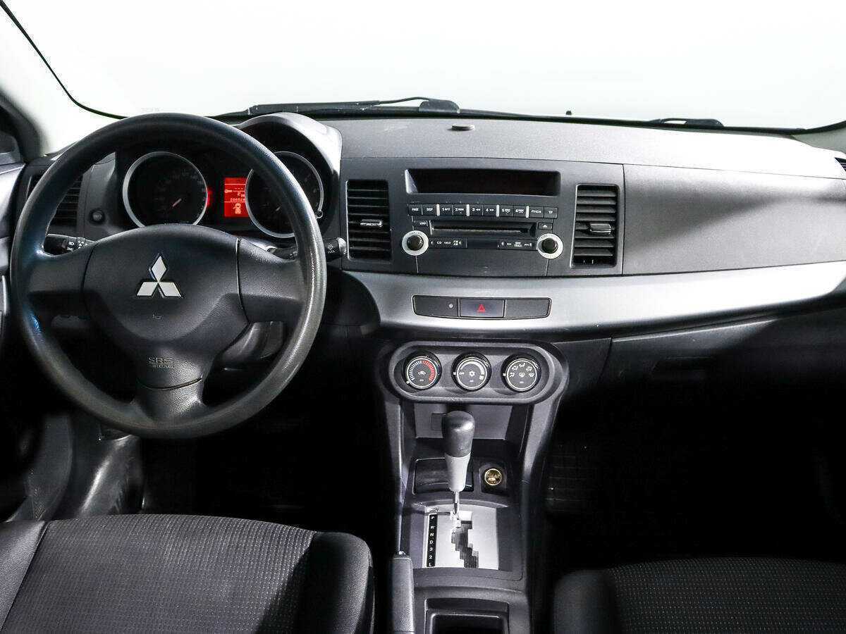 Купить Mitsubishi Lancer с пробегом. Фото: #11