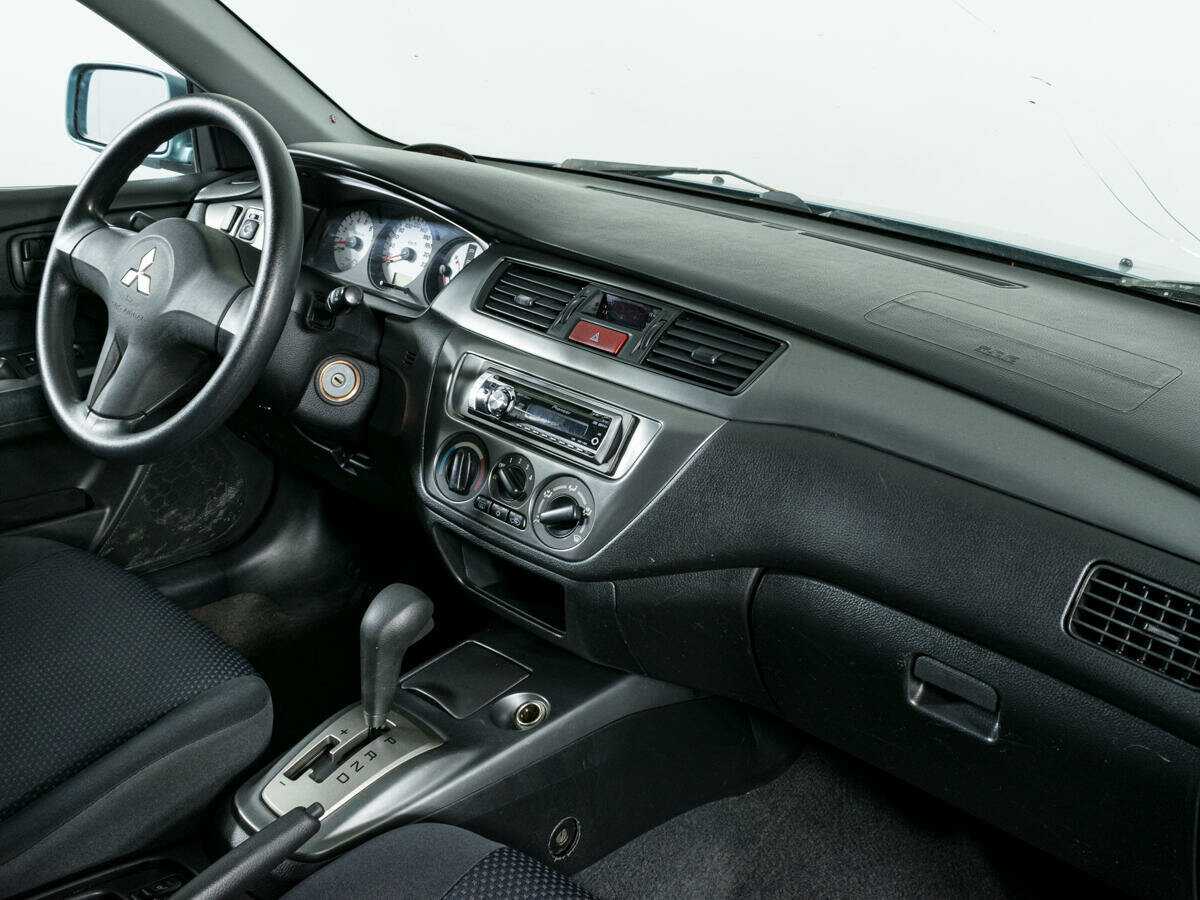 Купить Mitsubishi Lancer с пробегом. Фото: #8