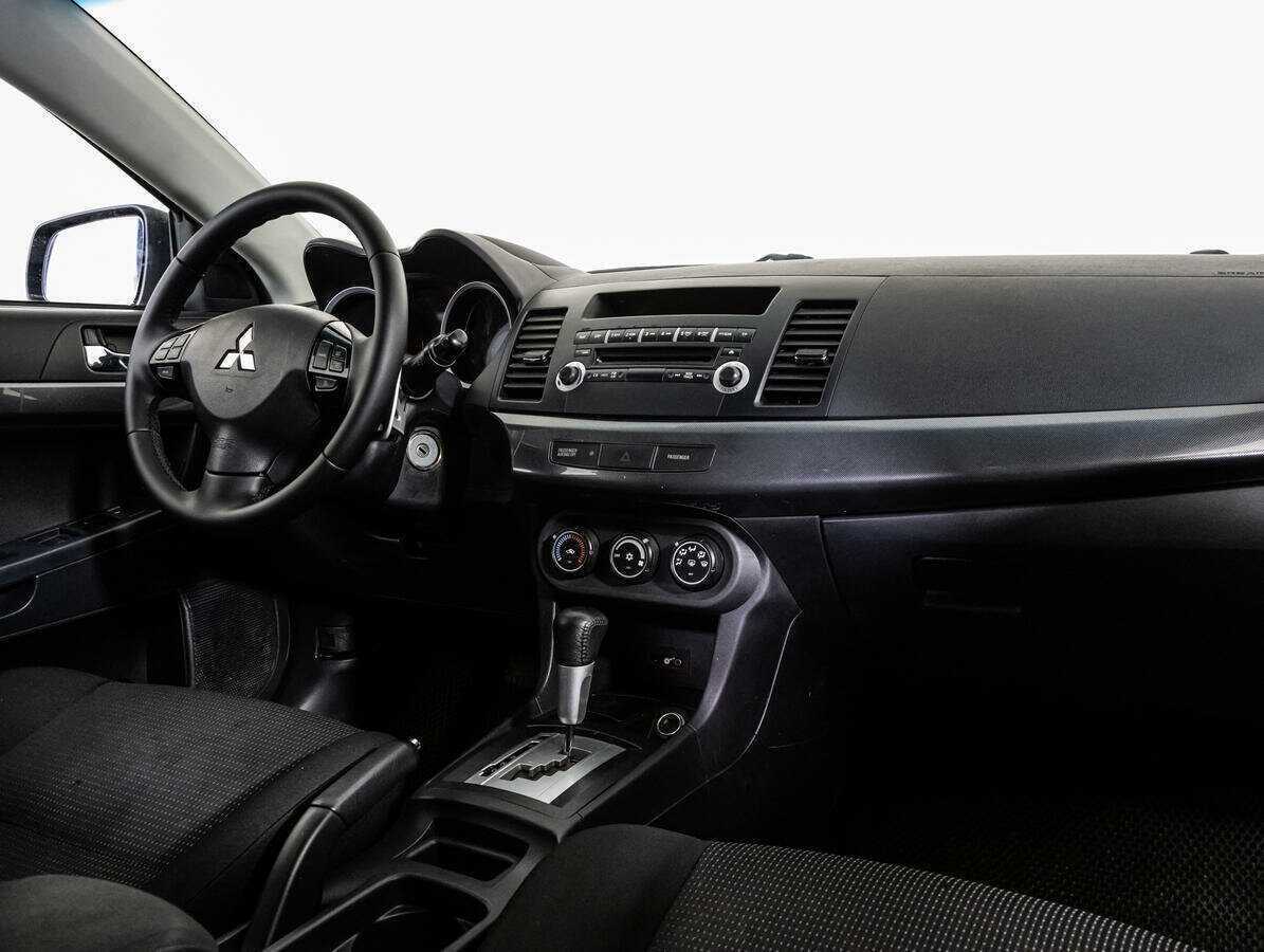 Купить Mitsubishi Lancer с пробегом. Фото: #8