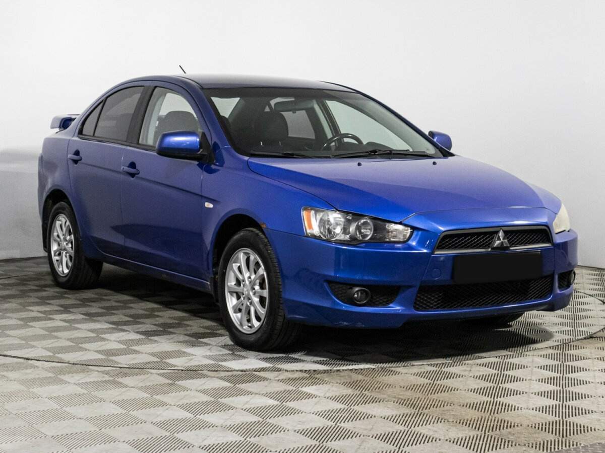 Купить Mitsubishi Lancer с пробегом. Фото: #2