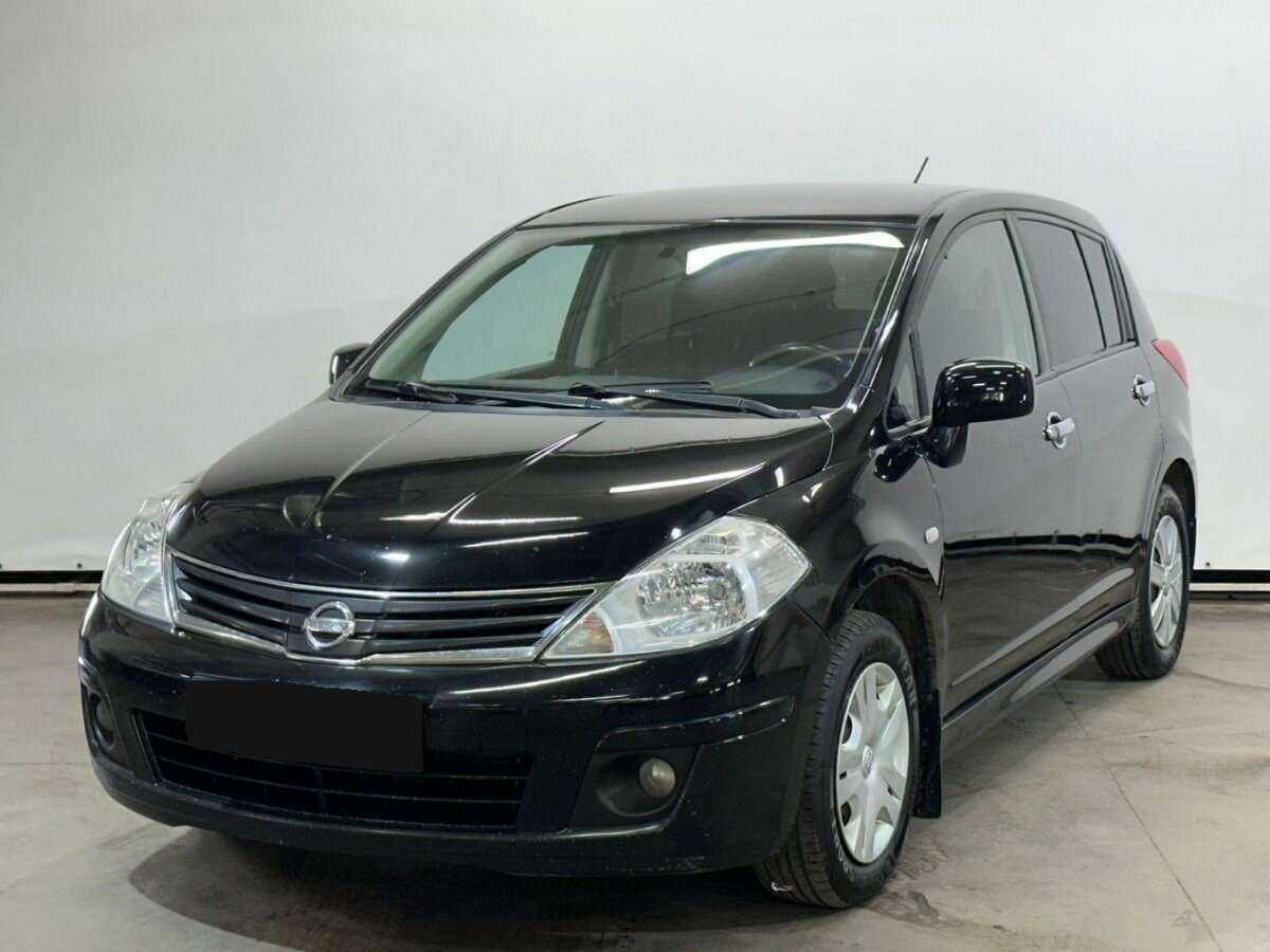Купить Nissan Tiida с пробегом. Посмотреть фото