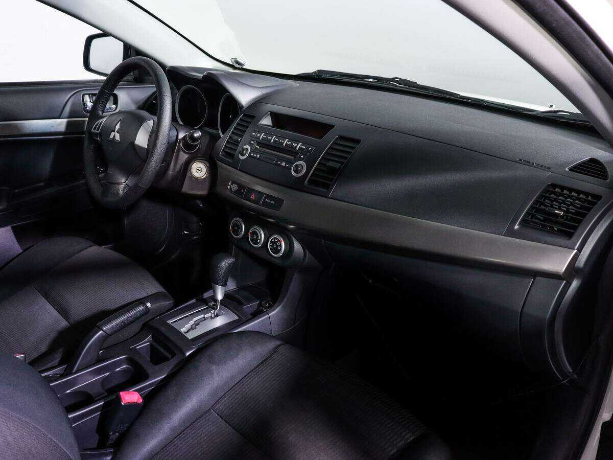 Купить Mitsubishi Lancer с пробегом. Фото: #8