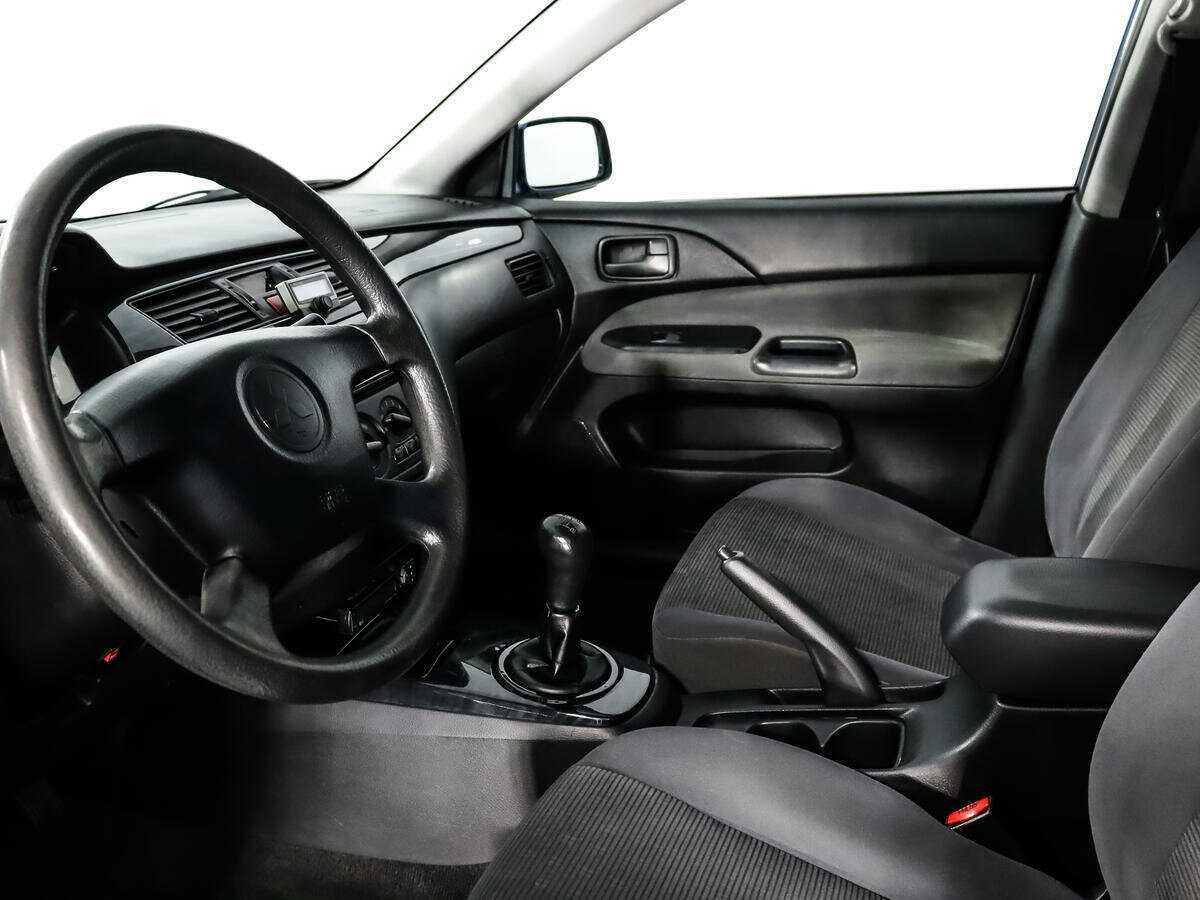 Купить Mitsubishi Lancer с пробегом. Фото: #8