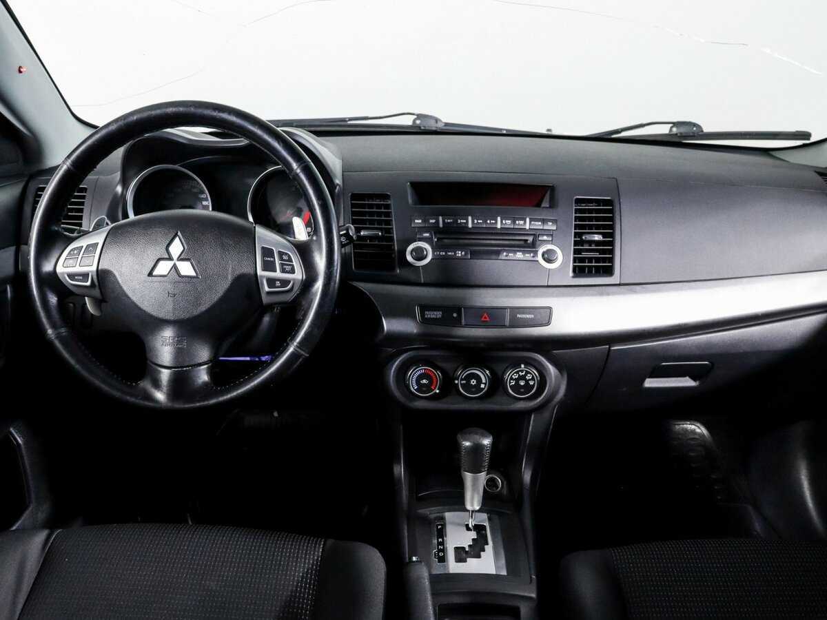 Купить Mitsubishi Lancer с пробегом. Фото: #8