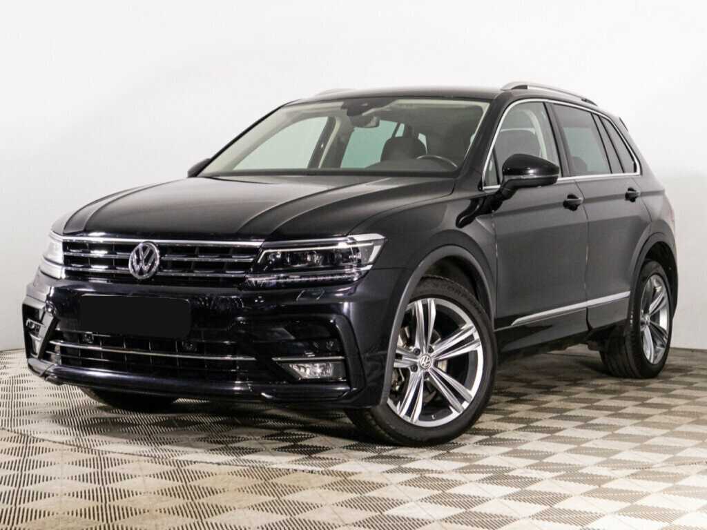 Купить Volkswagen Tiguan с пробегом. Посмотреть фото