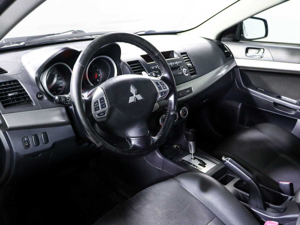 Купить Mitsubishi Lancer с пробегом. Фото: #11