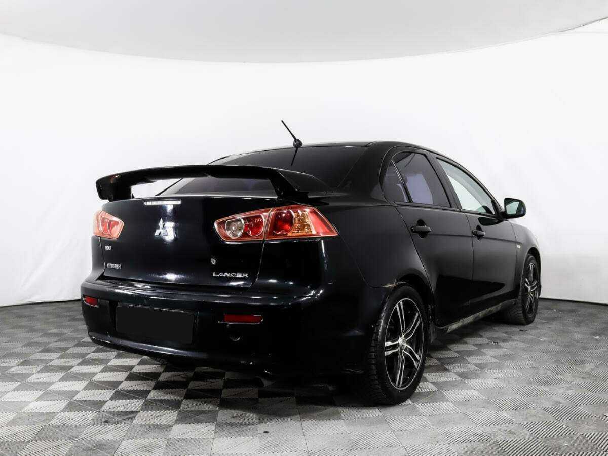 Купить Mitsubishi Lancer с пробегом. Фото: #4
