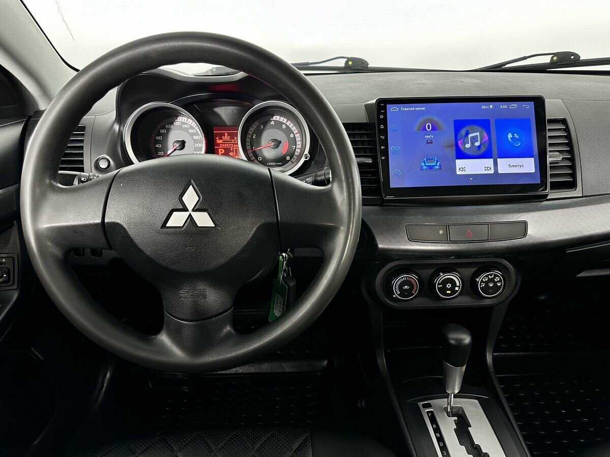 Купить Mitsubishi Lancer с пробегом. Фото: #9