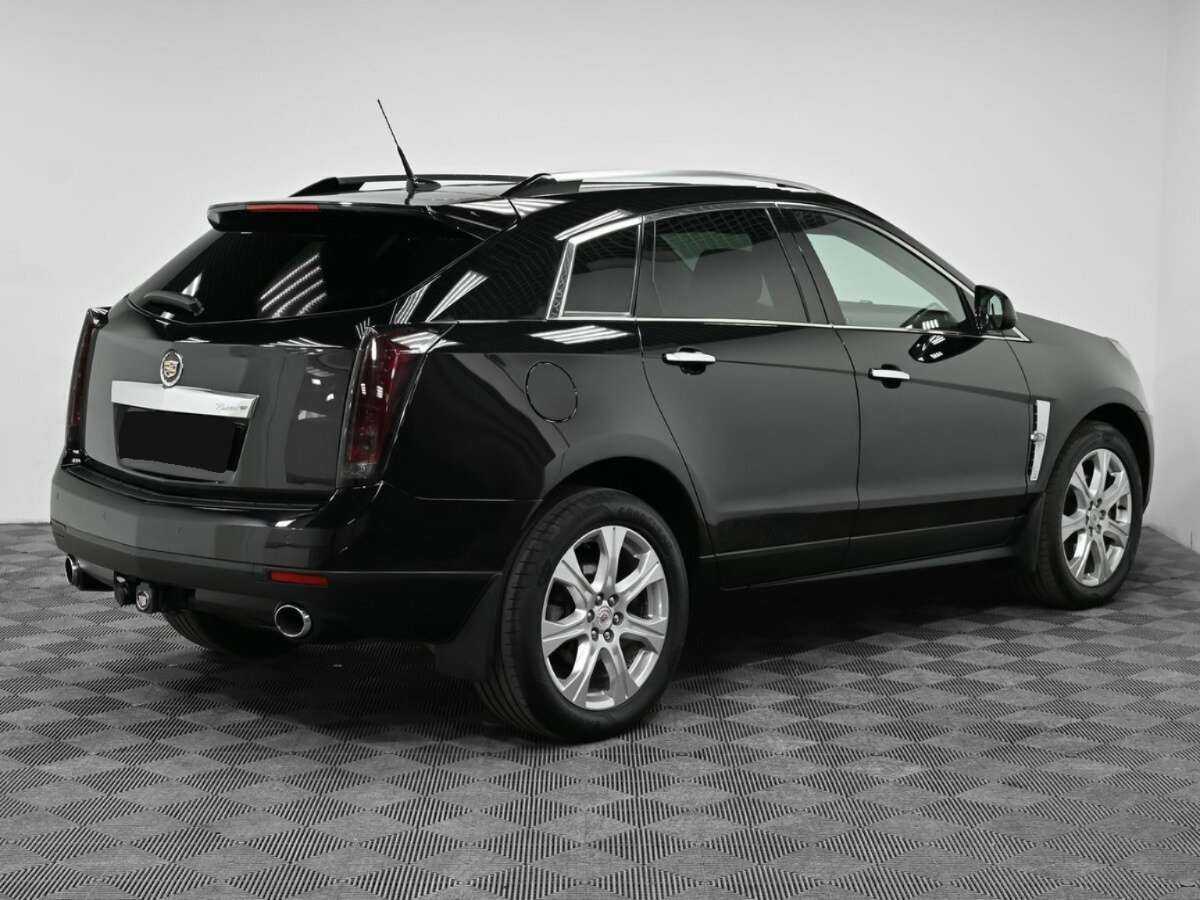 Купить Cadillac SRX с пробегом. Фото: #1