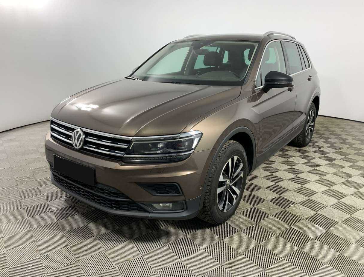 Купить Volkswagen Tiguan с пробегом. Посмотреть фото