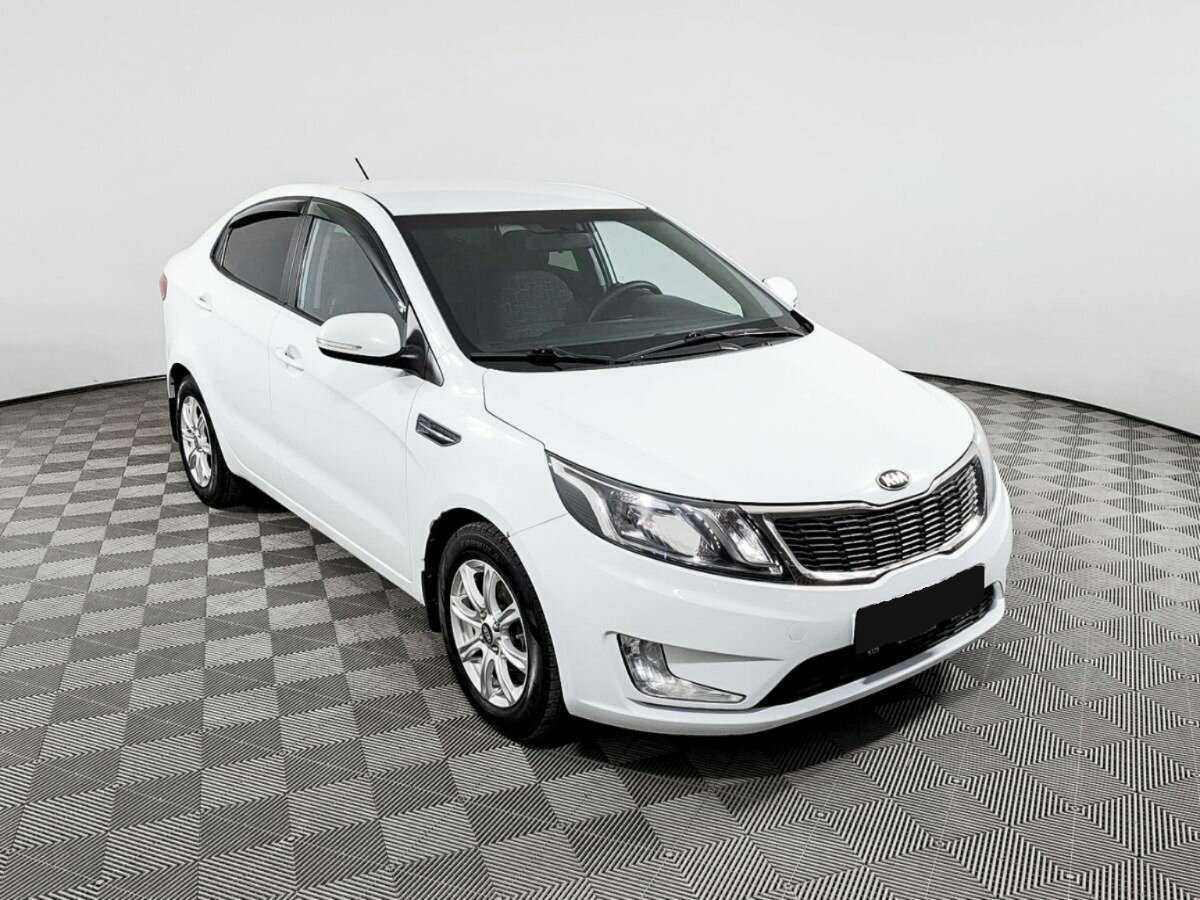 Купить Kia Rio с пробегом. Фото: #2