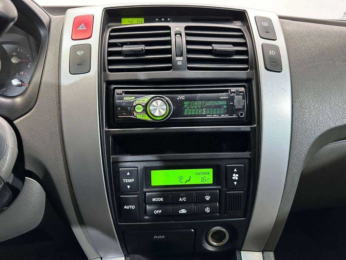 Купить Hyundai Tucson с пробегом. Фото: #11
