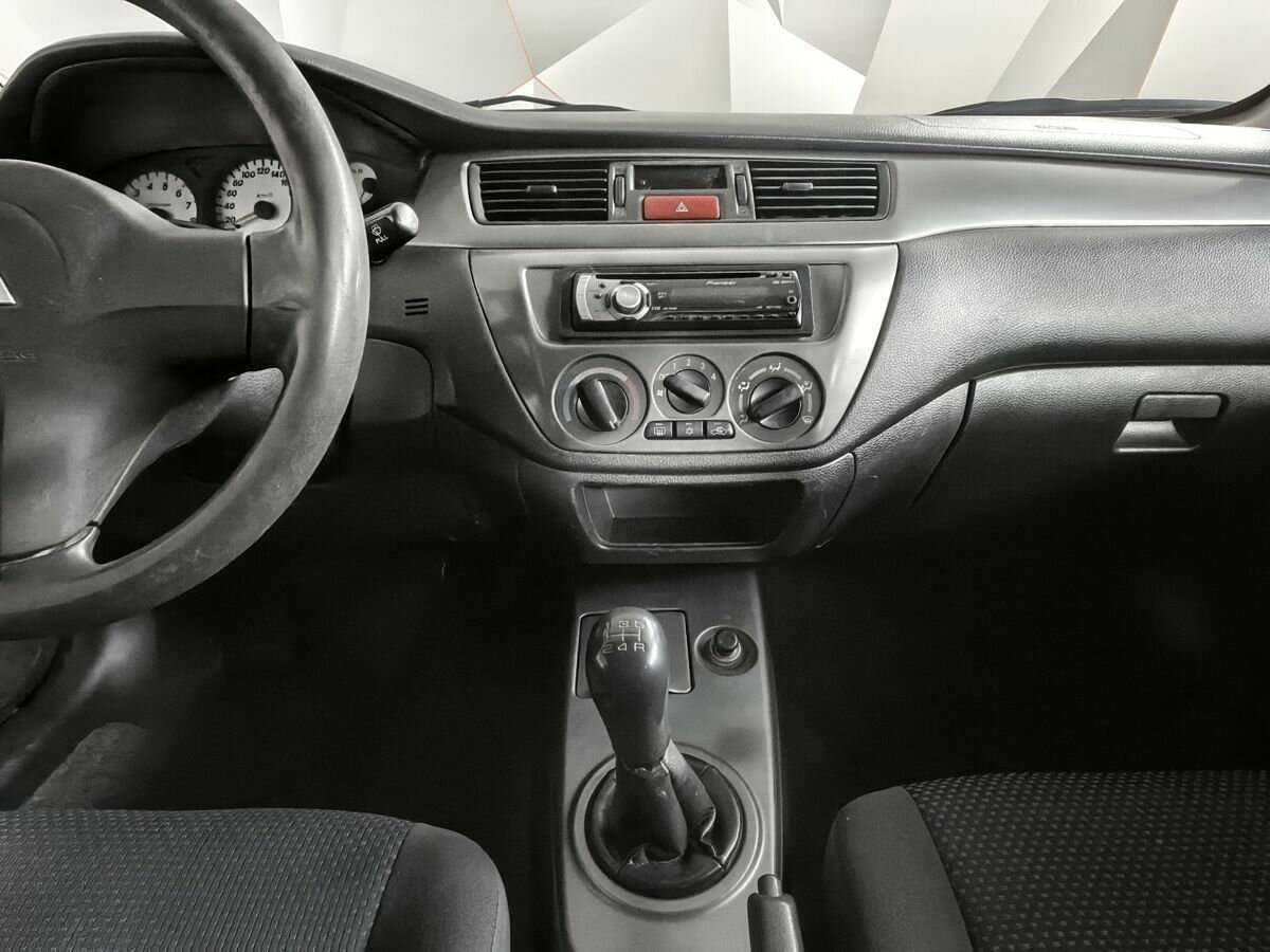 Купить Mitsubishi Lancer с пробегом. Фото: #10