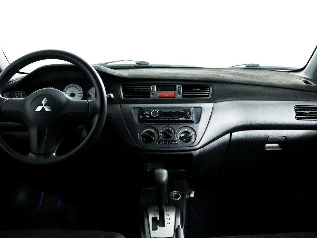 Купить Mitsubishi Lancer с пробегом. Фото: #10