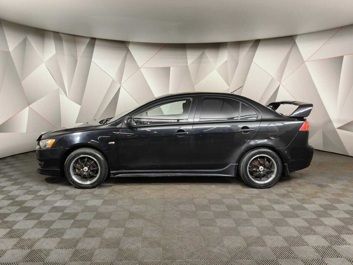 Купить Mitsubishi Lancer с пробегом. Фото: #4
