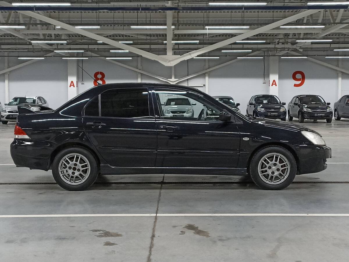 Купить Mitsubishi Lancer с пробегом. Фото: #3