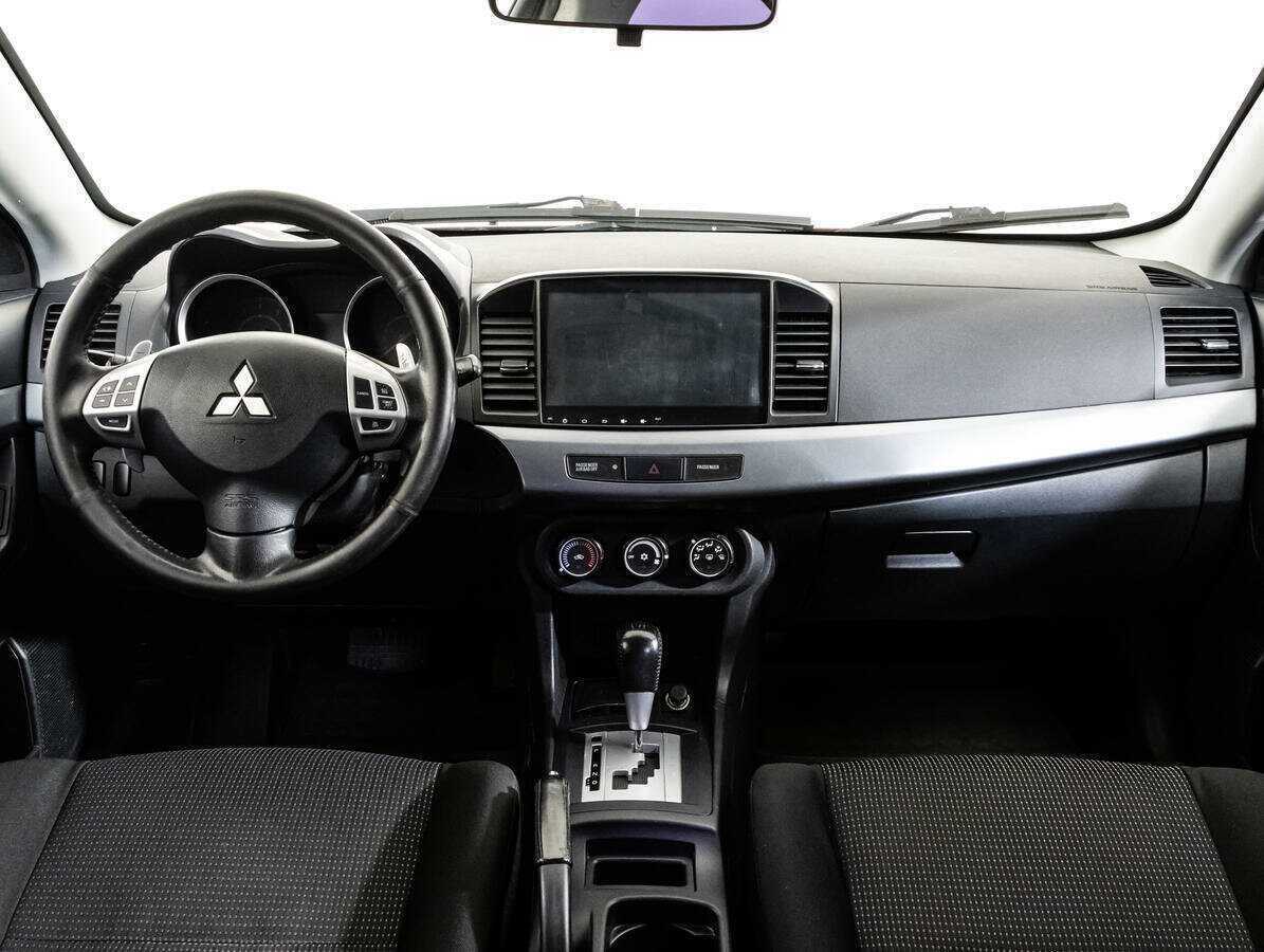 Купить Mitsubishi Lancer с пробегом. Фото: #9
