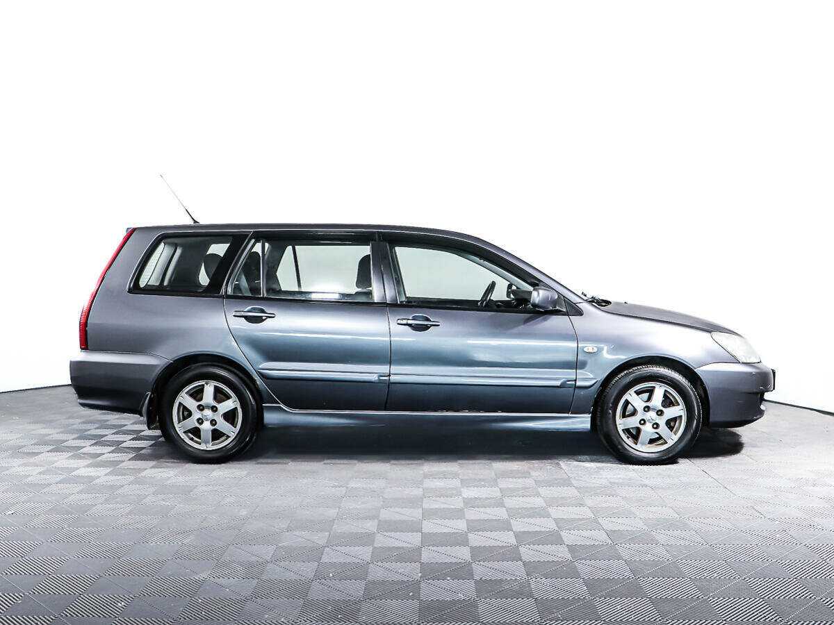 Купить Mitsubishi Lancer с пробегом. Фото: #3