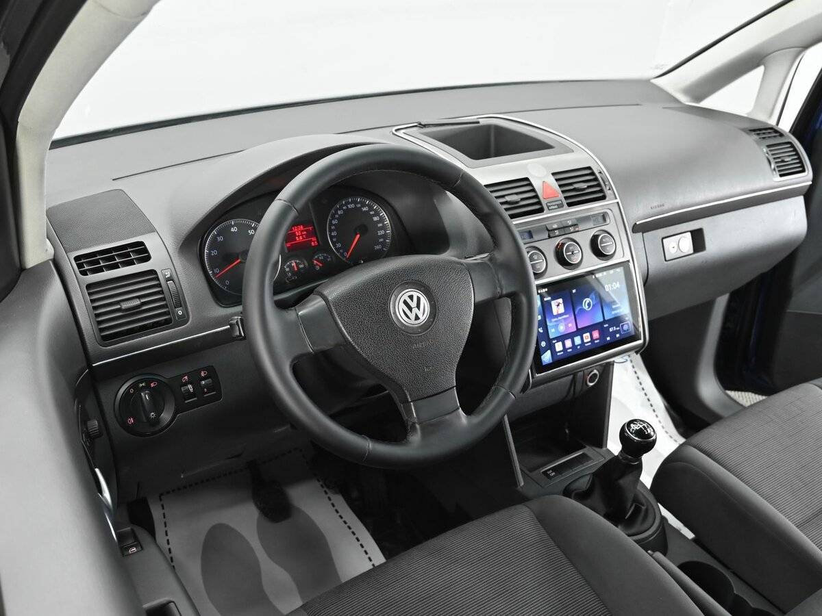 Купить Volkswagen Touran с пробегом. Фото: #7