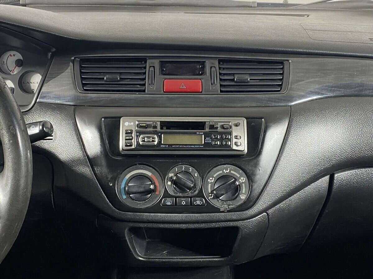 Купить Mitsubishi Lancer с пробегом. Фото: #11