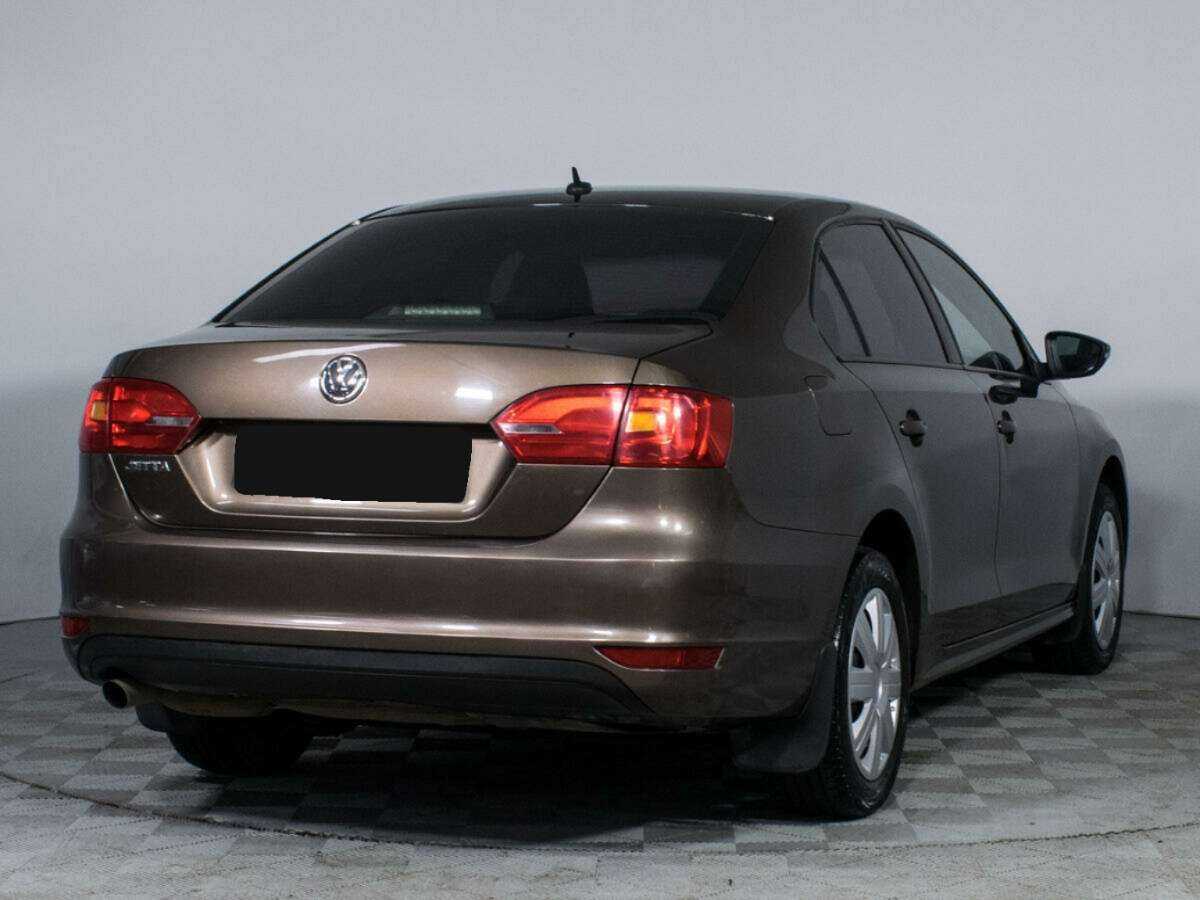 Купить Volkswagen Jetta с пробегом. Фото: #4