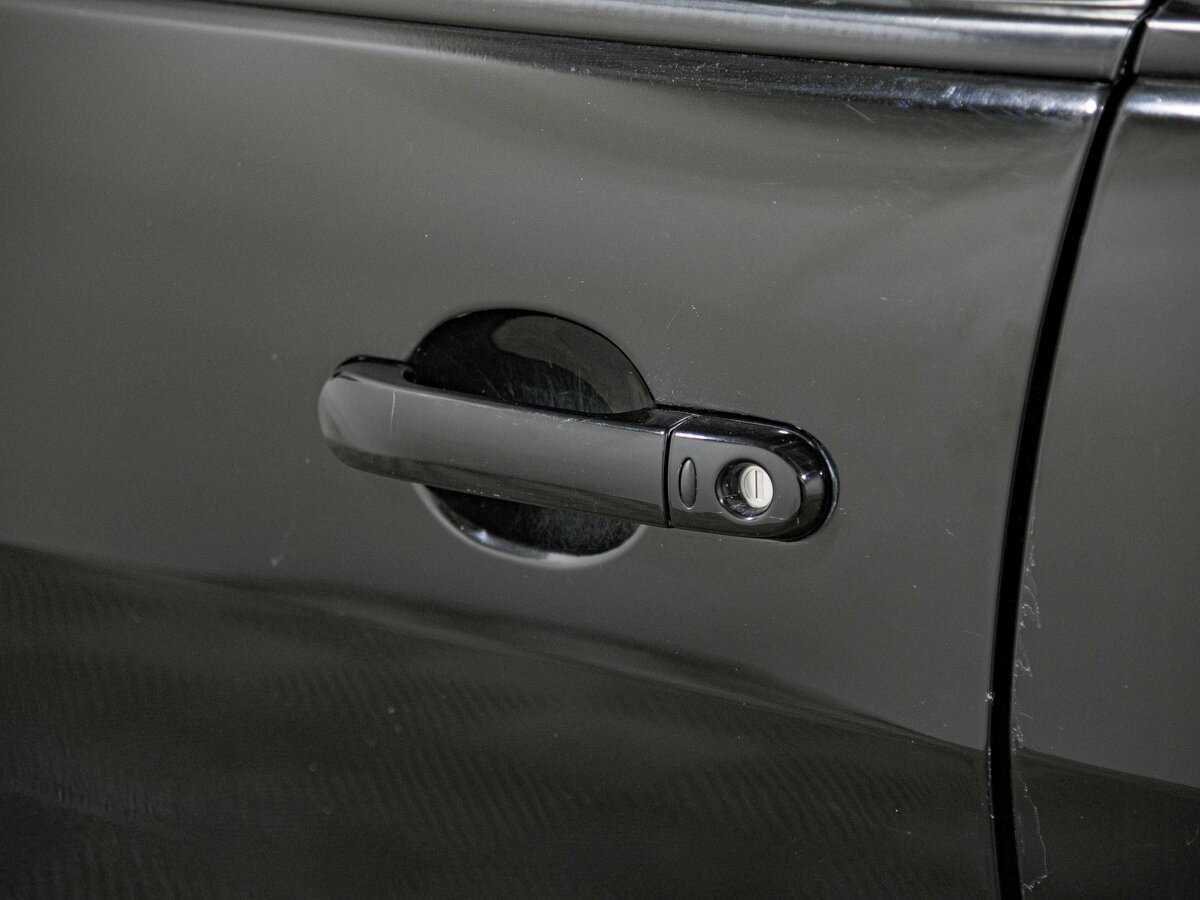 Купить Nissan Tiida с пробегом. Фото: #17