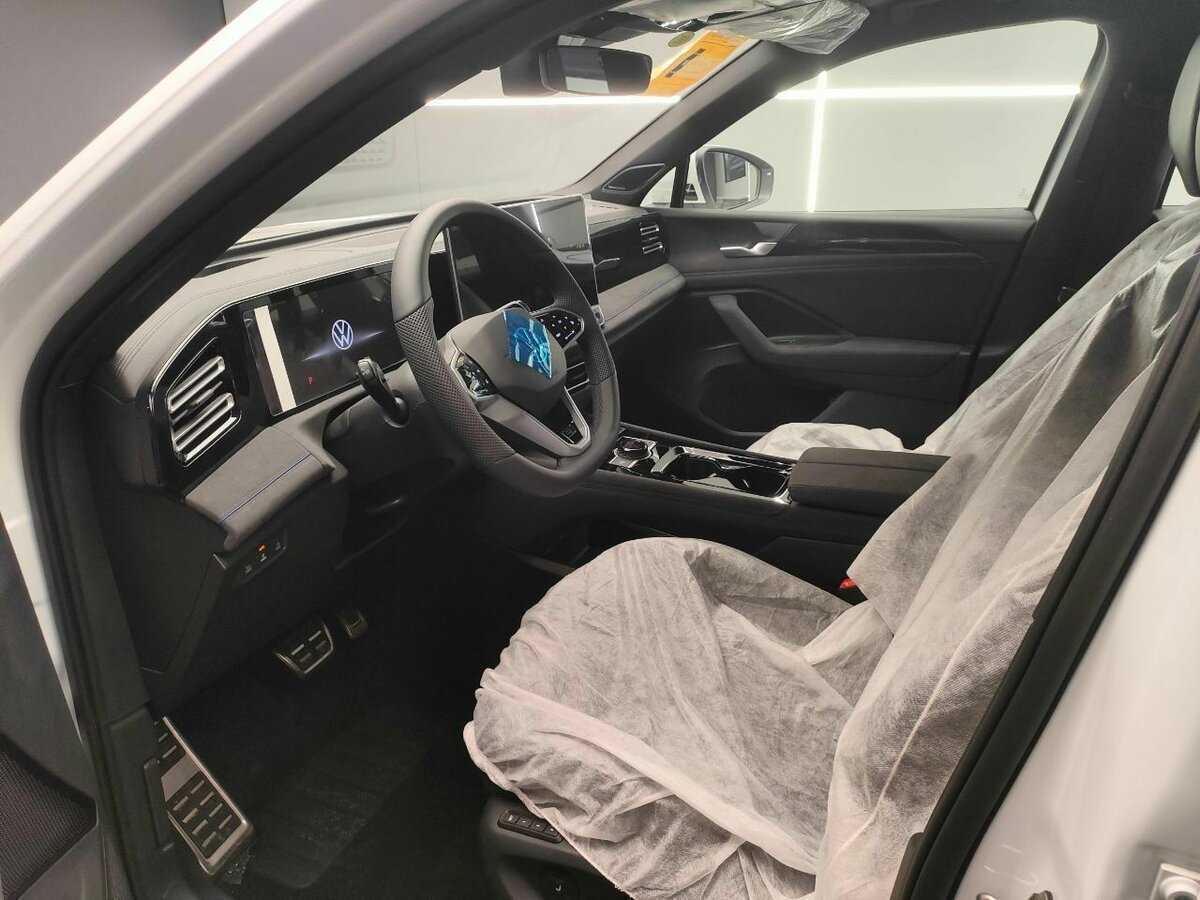 Купить Volkswagen Tiguan с пробегом. Фото: #14