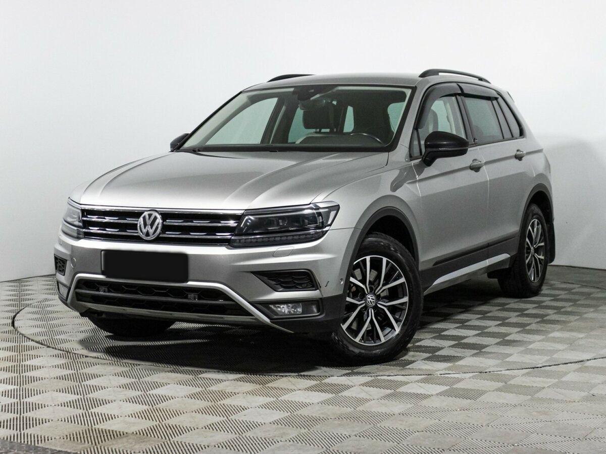 Купить Volkswagen Tiguan с пробегом. Посмотреть фото