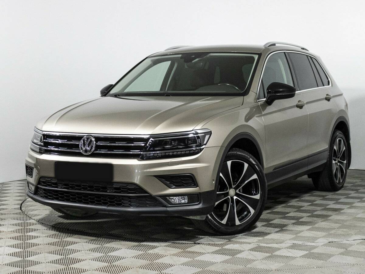 Купить Volkswagen Tiguan с пробегом. Посмотреть фото