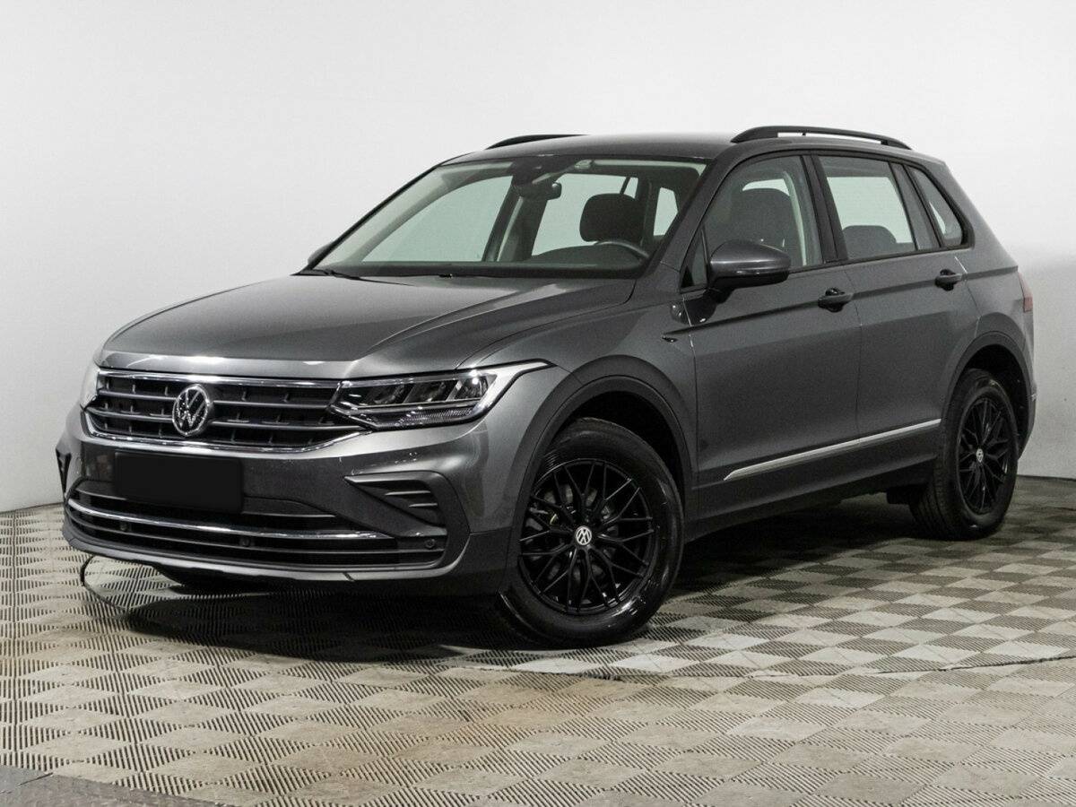 Купить Volkswagen Tiguan с пробегом. Посмотреть фото