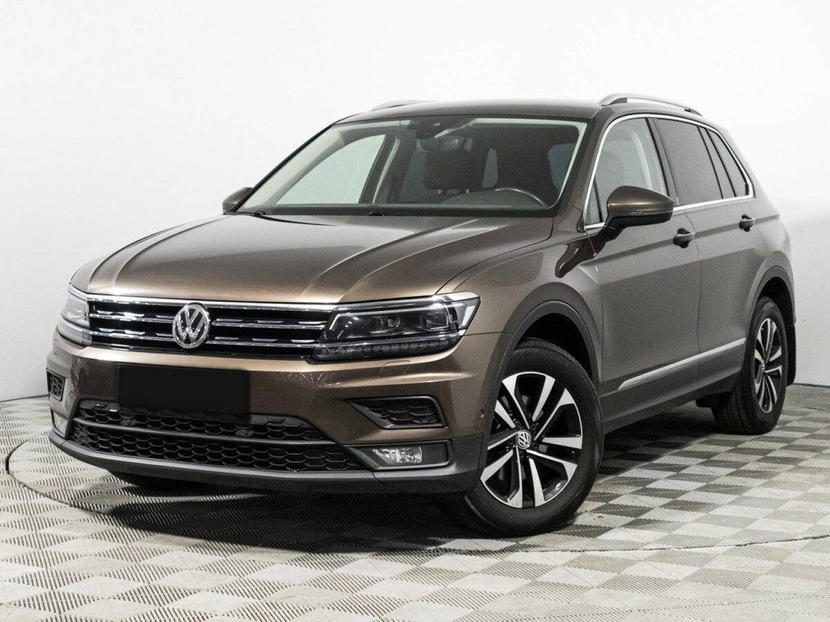 Купить Volkswagen Tiguan с пробегом. Посмотреть фото