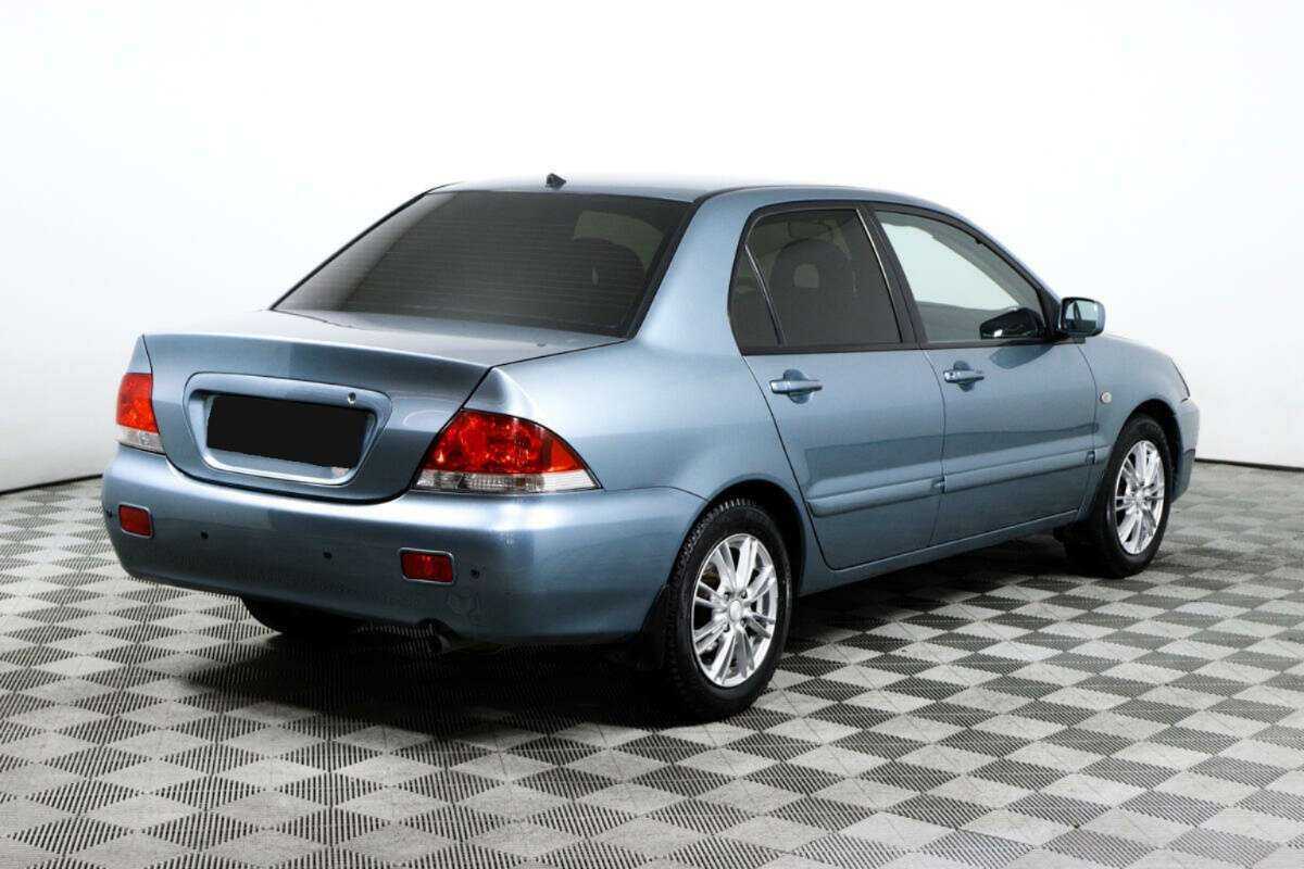 Купить Mitsubishi Lancer с пробегом. Фото: #4